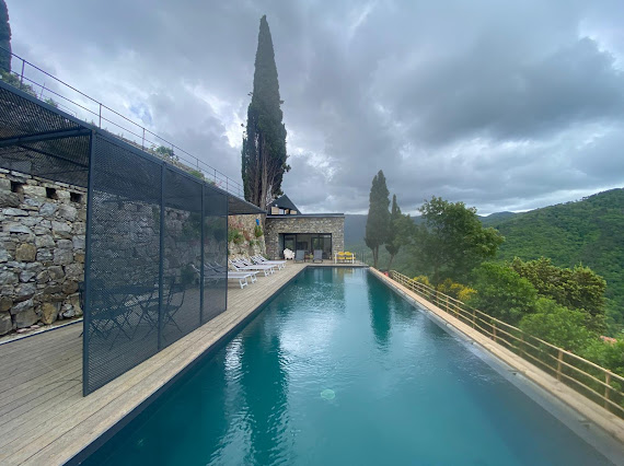 Infinity pool overlooking Ligurian hills